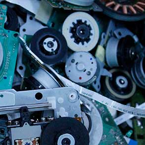 A closeup of a pile of VCR motors